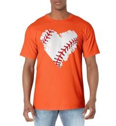 a man wearing an orange shirt with a heart shaped baseball on the back of it