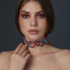 Multi-colored, embroidered choker necklace. Handmade by Kirki's charms this necklace is made from vintage embroidered ribbon  handcrafted in India.  Ι collect these traditional handcrafted pieces and try to give them new birth. Finishes to velvet turquoise ribbon. Adjustable Multicolor Choker For Parties, Adjustable Multicolor Party Choker, Handmade Orange Necklaces For Party, Colorful Beads Choker For Party, Party Choker Necklace With Colorful Beads, Handmade Adjustable Choker For Party, Bohemian Multicolor Choker For Party, Embroidery Choker, Choker Handmade