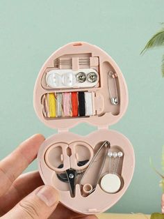 Power Supply:None \nColor:Baby Pink \nType:Travel Hanger \nMaterial:PVC \nPattern Type:Geometric \nPattern Type:Letter \nPattern Type:Plain \nComposition:100% Polyvinyl Chloride \nGender:Men \nGender:Women \n Emergency Clothes, Small Sewing Kit, Portable Sewing Kit, Mini Scissors, Mini Sewing Kit, Travel Sewing Kit, Travel Sewing, Household Sewing, Repair Clothes