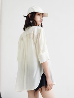 MO&Co. Women's Puff Sleeve Pocket Shirt - Classic shirt x puff mid-sleeve design- Large 3D flap pocketCode : MBB2SHT015&MBC2SHTT13Length of size M is 73cmWhite : Model is 175cm tall and wearing a size M MATERIALS & CARE : Material : 83.3% Lyocell 16.7% PolyesterHand wash separately below 30°CDo not machine wash, do not bleachHang to dry in the shade, do not dryIron at low temperature, do not soakWash with neutral detergentPlease select your own size in the size chart according to your figure and Fall Casual Shirt With Balloon Sleeves, Casual Fall Shirt With Balloon Sleeves, Casual Balloon Sleeve Shirt For Fall, Casual Half Sleeve Shirt For Daywear, Casual Oversized Blouse With Puff Sleeves, Summer Casual Puff Sleeve Shirt, Oversized Puff Sleeve Top For Work, Casual Summer Shirt With Puff Sleeves, Casual White Puff Sleeve Shirt