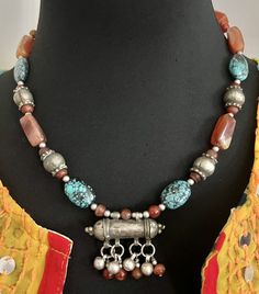 Yemeni vintage Hirz W/ old carnelian beads & blue Turquoise Handmade Necklace.  | eBay Traditional Turquoise Necklace For Healing, Traditional Turquoise Necklace With Natural Stones For Healing, Traditional Turquoise Necklace For Healing With Natural Stones, Vintage Turquoise Pendant Necklace With Natural Stones, Vintage Turquoise Necklace With Round Natural Stones, Vintage Turquoise Necklace With Round Beads, Vintage Turquoise Necklace With Round Gemstone Beads, Bohemian Gemstone Beads And Cabochons In Brown, Traditional Multicolor Carnelian Necklaces