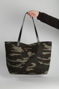 Details:  - Camouflage Tote Bag - Measurements: 32cm high x 49cm wide x 14cm deep - Black inside - Inner pocket - Black leather handles - Handmade in Barcelona   #totebag #camobag #bag #camuflaje #bolsos #handmade #fashion #lagut Military Style Rectangular Bag For Everyday Use, Military Style Satchel Bag For Everyday Use, Military Style Satchel Bag For Daily Use, Military Style Satchel For Everyday Use, Military Style Rectangular Travel Bag, Camouflage Travel Bag With Adjustable Strap, Military Style Shoulder Bag For Everyday Use, Military Style Shoulder Bag For Travel, Military Style Khaki Bags For Everyday Use