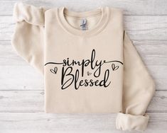 a t - shirt that says simply be loved on it