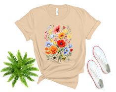 🎁 WELCOME TO OUR SHOP! Our graphic tees, sourced from the well-known brand BELLA+CANVAS, are both soft and trendy. They are long enough to wear with a pair of leggings, and soft enough to roll the sleeves, and if you want to add some flair, just tie it up in a knot. However you decide to wear it, you'll love the fit and comfort of this tee. 🛒 HOW TO ORDER 1️⃣ Select the shirt size & color. 2️⃣ Select the quantity. 3️⃣ Click "ADD TO CART". 4️⃣ You can go back to add more products for your loved Spring Floral Print Graphic Tee, Spring Multicolor Floral Print T-shirt, Multicolor Floral Print T-shirt For Spring, Spring Multicolor Shirt With Sublimation Print, Multicolor Printed Tops For Spring, Spring Graphic Tee With Sublimation Print, Spring Graphic Tee Shirt With Sublimation Print, Spring Floral Print Graphic Tee Shirt, Floral Print Graphic Tee For Spring