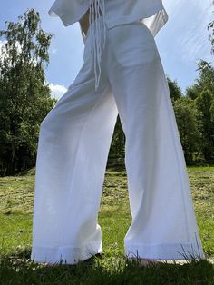 Presenting fantastic loose fitting elasticated pants that are made of ecologically grown cotton muslin. They are great for a casual style as well as the elegant evening.  Very classic and elegant summer pants. It has got 2 pockets on the sides. It is the ultimate fabric for hot weather as it breathes and absorbs moisture better that most fabrics. Extremely soft touch. Please write me a note if you would like any other colour from our fabric options, using a number or a name of a colour of your c Casual Cotton Parachute Pants For Vacation, Relaxed Fit High-waisted Harem Pants For Beach, High-waisted Relaxed Fit Harem Pants For Beach, White Baggy Harem Pants For Vacation, Baggy White Harem Pants For Vacation, Beach High-waisted Relaxed Fit Harem Pants, Baggy Wide Leg Ankle-length Pants For Beach, Baggy Ankle-length Wide Leg Pants For Beach, White Baggy Pants For Vacation