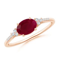 an oval shaped ruby and diamond ring