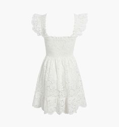 An exciting new addition to our Collector's edit, meet the Lace Elizabeth Nap Dress®. Collector’s Edition pieces are extra special versions of our signature styles, made from elevated fabrics. The Lace Elizabeth Nap Dress® has elasticated smocking, ruffled shoulders, a mini-length skirt, and pockets. It’s a shorter version of our bestselling Ellie Nap Dress®, but now in unlined white lace, making it styleable for any bridal event. Throw on, and go!The Lace Elizabeth Nap Dress® is made unlined; we recommend styling it over our new slips (sold separately) or a bodysuit. Nap Dress, Signature Styles, Bridal Event, House On A Hill, Lace Making, Signature Style, The Collector, Then And Now, White Lace