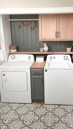 a washer and dryer in a small room