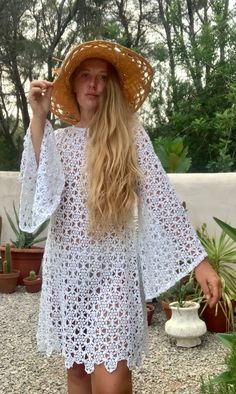 Very cool vintage white crochet oversized bell sleeve dress up-cycled by Vagabond Ibiza We hand source antique and vintage crochet & lace textiles and up-cycle it here in Ibiza in to unique on off a kind garment just for you. Due to the nature there could be some imperfections but we do our best to only recycle mint condition textiles. Hand made in Ibiza with Love Size is Small Condition is perfect White Crochet Bohemian Cover-up, White Crochet Cover-up For Festival, Oversized Crochet Top For Beach In Spring, White Long Sleeve Crochet Beach Cover-up, White Bohemian Long Crochet Dress, White Long Sleeve Crochet Beach Dress, White Long Sleeve Crochet Dress For Beach, White Long Bohemian Crochet Dress, White Bohemian Crochet Lace Cover-up