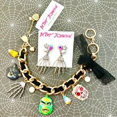 From A 2021 Collection, New Old Stock Release. Set Features A Fun Charm Bracelet That Blends Kitsch With Glam. Spooky Masks, Creepy Hand, Winking Black Cat And Pave’ Crystal Candy Corn Charms. Fabric Mesh Bow. Crystals, Stones, Faux Pearls, Gold And Silver Tone Metals. Ribbon Woven Into The Chain. Adjustable Lengths, Max 8”. Earrings About 2” Drop. Nwt, Htf. Collectible! Trendy Metal Jewelry For Halloween, Trendy Metal Halloween Jewelry, Trendy Halloween Metal Jewelry, Metal Halloween Party Jewelry, Nickel-free Jewelry For Halloween Party, Nickel-free Halloween Party Jewelry, Gold Halloween Party Jewelry, Masks Creepy, Creepy Hand