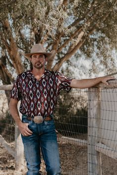 We love a good polo in a man, especially with a nod to the western flair. Runs true to size. Lightweight. Material: 95% Polyester | 5% Spandex Jeff is wearing his true size, 2XL Nfr Style, Authentic Turquoise Jewelry, Top Graphic Tees, Turquoise Jewelry, Love A, Bottoms Pants, Short Pants, Jumpsuit Dress, A Man