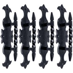 six black wrought iron brackets on white background