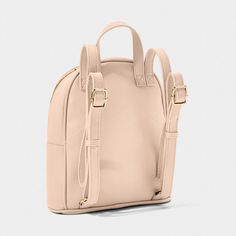 The Cleo Backpack is the perfect companion for travel or daily use. Its compact size and high quality vegan leather make it both stylish and practical. The soft nude pink color adds a touch of elegance to any outfit. Stay organized and look great with the Cleo Backpack! Dimensions: 10 5/8" x 8 11/16" x 3 3/4" By Katie Loxton London Cleo Backpack By Katie Loxton Chic Soft Leather Travel Backpack, Versatile Everyday Blush Bag, Blush Bag With Adjustable Strap For On-the-go, Blush Bag With Zipper For Daily Use, Trendy Beige Leather Backpack With Detachable Strap, Chic Soft Leather Backpack For Daily Use, Blush Bag With Zipper For Everyday Use, Versatile Beige Leather Backpack With Adjustable Strap, Chic Leather Backpack With Zipper For Daily Use