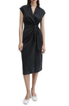 Set out from the office to nights on the town in this versatile wrap dress that's topped with a sleek and sophisticated collar. True wrap style with side tie closure Johnny collar Cap sleeves Unlined 83% modal, 17% polyester Machine wash, line dry Imported Chic Ruched Wrap Dress, Workwear Ruched Midi Dress With Surplice Neckline, Ruched Midi Dress With Surplice Neckline For Work, Ruched Surplice Neckline Midi Dress For Work, Elegant Viscose Midi Dress With Tie Waist, Chic Summer Silk Wrap Dress, Elegant Summer Midi Dress With Knot Detail, Chic Silk Wrap Dress, Silk Tie Waist Wrap Dress For Formal Occasions