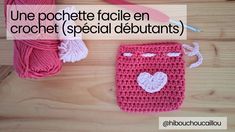 a crocheted bag with a heart on it and yarn next to it that says une pochette facile en crochet special debutants