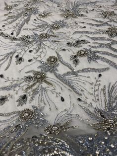 This beautiful luxury lace is classy and sophisticated. This fabric is available and sold at 1/2 or 1 plus a yard This rich lace is perfect for bridal wear, evening gowns, dresses, and more. Also use this fabric as an applique to design your next dress to brighten and sparkle up your next special occasion, wedding, and etc. 58'' - 59'' wide Elegant Tulle Fabric With 3d Lace Embroidery, Elegant Lace Tulle Fabric With 3d Embroidery, Elegant Embroidered Fabric With Lace Work For Banquet, Elegant Embroidered Fabric With Lace Work For Banquets, Elegant Embroidered Tulle Fabric, Elegant Lace Fabric With Appliques, Elegant Lace Embroidered Fabric With Appliques, Elegant Applique Tulle Fabric For Party, Elegant Tulle Fabric With Appliques For Party