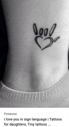 a small tattoo on the side of a woman's stomach that says i love you sign language tattoos for daughters, tiny tattoos