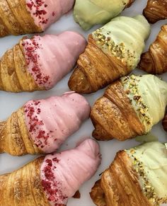 there are many croissants with different toppings on them