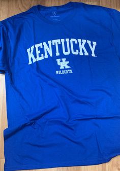 kentucky wildcats t - shirt laying on the floor