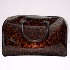 Saint Laurent Duffle Bag Patent Leather (Tortoise Shell) Retail: $3750.00 Ysl Wallet On Chain, Tan Clutch, Ysl Wallet, Shell Color, Saint Laurent Bags, Yves Saint Laurent Bags, Gold Bag, Raffia Bag, Unique Bags