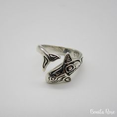 "Woman's Sterling silver Northwest Native ring with Orca Whale wrapped band. 925 silver. Measures approx. 13mm width from top fin to mouth (approx. 1/2\") Made in Mount Vernon, WA USA. Thanks for visiting!" Artisan Sterling Silver Ring With Polished Finish, Artisan Etched Ring Jewelry, Unique Open Band Jewelry With Polished Finish, Adjustable Symbolic Rings With Polished Finish, Adjustable Spiritual Sterling Silver Engraved Ring, Etched Sterling Silver Open Ring Jewelry, Symbolic Engraved Open Ring Jewelry, Unique Sterling Silver Open Band Rings, Etched Sterling Silver Open Ring