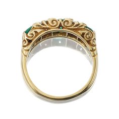 Antique Zambian Emerald and Diamond Half Hoop Ring The Archie ring is an authentic vintage emerald and diamond ring from the Edwardian Era circa 1910. This GIA-certified ring features three Asscher cut Zambian emeralds of moderate enhancement combining for approximately 0.75-carats. Alternating between the emeralds are two Old European Cut diamonds of approximately I-J color, VS clarity combining for roughly 0.38-carats. Eight small diamonds are set between the stones. The stones are set in an 1 Heirloom Emerald-cut Ring With Single Cut Diamonds, Heirloom Emerald Cut Ring With Single Cut Diamonds, Heirloom Oval Emerald Ring With Single Cut Diamonds, Heirloom Oval Emerald Ring With Rose Cut Diamonds, Formal Emerald Cut Ring With Rose Cut Diamonds, Formal Emerald Cut Emerald Ring With Rose Cut Diamonds, Classic Oval Emerald Ring With Single Cut Diamonds, Heirloom Emerald Ring With Intricate Design For Anniversary, Heirloom Three-stone Emerald Ring