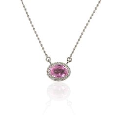 This is part of Chairish’s Fine Jewelry assortment.  Minimal Pink Sapphire Halo Diamond Pendant Necklace with Chain in 14K Gold studded with oval cut pink sapphire with halo of diamonds. This stunning piece of jewelry instantly elevates a casual look or dressy outfit.  Sapphire stimulates concentration and reduces stress. Designed with oval cut pink sapphire set with diamonds around set in solid gold making a stunning pendant. This beautiful handcrafted pendant is a perfect Necklace Gift, Bridal Oval Pink Sapphire Jewelry With Diamond Accents, Oval Pink Sapphire Jewelry With Halo Setting, Pink Sapphire Necklace, Dressy Outfit, Diamond Solitaire Necklace, Solitaire Necklaces, Birthstone Pendant, Sapphire Necklace, October Birthstone