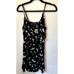 American Eagle Outfitters Dress Size Xs Black White Floral Vneck Peep Hole Nwt I Put Measurements In Photos-All Of The Measurements Are Approximate. Thank You For Shopping The Teacher Treasure Chest! Black V-neck Dress For Summer Brunch, Black V-neck Mini Dress For Vacation, Black V-neck Mini Dress For Summer, Black V-neck Summer Dress, Black V-neck Dress For Brunch, Black V-neck Dress For Spring Beach Occasions, Black V-neck Mini Dress For Spring, Casual Black V-neck Dress For Brunch, Black V-neck Dress With Surplice Neckline For Spring