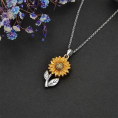 🌻DESIGN CONCEPT🌻 "NO longer by my side, but forever in my heart." The urn unscrews from the top, allowing you to place a small amount of ashes inside. If you don't want/have ashes, you can also add crushed flowers, dirt, hair, sand or notepaper.🌻MEASUREMENT🌻The sunflower urn necklace A measures approximately 35.5mm*17.5mm (1.39"*0.68"). Thickness: 6.5mm/0.25in. Weight: 8.2g. Rolo chain length: 18in.The sunflower urn necklace B: The sunflower urn measures approximately 38mm*19mm (1.49"*0.74"). chain length: 18in + 2in.The sunflower urn necklace C:Pendant Size: 0.94*0.59inch (24*15mm), with 18 inches +2 inches extended adjustable length.Sunflowere urn necklace for ashes is made of 925 sterling silver with gold plated. The oxidation effect makes the necklace look more advanced.Sunflower P Sunflower Design Jewelry For Mother's Day, Silver Flower Jewelry For Memorial, Dainty Silver Sunflower Jewelry, Silver Sunflower Necklace For Mother's Day, Sunflower Design Jewelry For Mother's Day Anniversary, Sunflower Jewelry For Anniversary And Mother's Day, Hair Memorial Jewelry, Cremat, Crushed Flowers