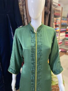 A stunningly marvellous outfit featuring Kashmiri Aari embroidery. - - - - - - - - - - - - - - - - - - - - Product Details- Condition: Brand New (made to order)– Handmade– Style: Indian Ethnic Suit– Embroidery: Kashmiri Aari Work with Silk Thread- Colour: Bottle & Lime Green– Care Instructions: Dry Clean OnlyF A B R I CShirt: ChinonDupatta: ChinonLower: Indian CrepeF I N I S HUnstitched/Semi-StitchedYou can get it stitched locally.47+ inches of Shirt Length and up to full sleeves length.Stitched Fitted Multicolor Embroidered Sets, Fitted Dress With Multicolor Embroidery For Diwali, Anarkali Fitted Set With Multicolor Embroidery, Semi-stitched Silk Kurta For Designer Wear, Designer Long Sleeve Multicolor Embroidered Anarkali Set, Designer Long Sleeve Anarkali Set With Multicolor Embroidery, Designer Multicolor Embroidered Dress For Diwali, Designer Silk Straight Kurta, Raw Silk Dress With Multicolor Resham Embroidery