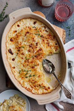 a casserole dish with a slice missing from it