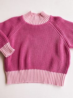 we recommend sizing down 1 for an oversized fit size down 2 for a true to size fit pink + light pink colorblock sweater 100% cotton care: machine wash cold, lay flat to dry. Pink Cotton Tops With Ribbed Collar, Pink Cotton Top With Ribbed Collar, Pink Long Sleeve Sweater For Layering, Pink Chunky Knit Crew Neck Sweater, Pink Chunky Knit Sweater With Crew Neck, Pink Chunky Knit Long Sleeve Top, Pink Cotton Sweater With Ribbed Collar, Pink Ribbed Collar Winter Sweater, Pink Long Sleeve Chunky Knit Top