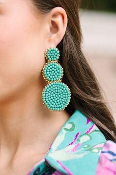 shop the mint, boutique clothing for women, trendy online boutique Turquoise Earrings For Spring Party, Spring Party Earrings With Round Beads, Green Beaded Earrings For Summer Fun, Fun Green Beaded Earrings For Summer, Playful Beaded Summer Earrings, Green Beaded Fun Earrings, Large Beaded Drop Earrings For Summer, Trendy Beaded Earrings With Dangling Beads For Summer, Trendy Beaded Drop Earrings For Vacation