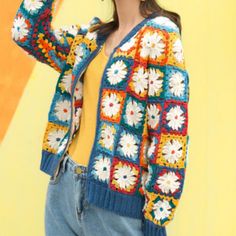 This colorful and vibrant cardigan model reflects an eye-catching design. Floral motif details make this cardigan both elegant and fun. Blue, orange, yellow and green tones create a wonderful contrast with white flower centers. This special design is both a work of art and a product of handicraft. This cardigan can be inspiring for those who radiate positive energy and are looking for a different pattern in their wardrobe. Daisy Cardigan, Radiate Positive Energy, Flower Center, Green Tones, Yellow And Green, Design Floral, Special Design, Different Patterns, White Flower