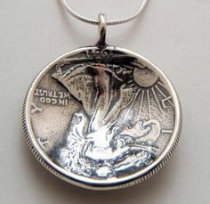 Pendant made from a vintage silver American Walking Liberty half dollar coin.  The back is domed as the front of the pendant. Yours may have a soldered ring as pictured, or it may be drilled, with a free-flowing ring, depending on what we have in stock. This pendant comes on a sterling silver bead chain.  Please select length from the drop-down menu.Thanks for looking.  Enjoy! Vintage Sterling Silver Coin Jewelry, Antique Coin-shaped Stamped 925 Jewelry, Antique Coin Shaped 925 Stamped Jewelry, Antique Coin-shaped 925 Stamped Jewelry, Unique Silver Coin-shaped Jewelry, Unique Silver Coin Jewelry, Silver Coin Jewelry, Hobo Art, Woodstock Ny