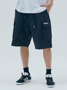 This is a comfortable and casual pants that are made out of high quality cotton 100% fabric. With design detail of comfortable loose silhouette and cargo pockets detail, it gives a trendy and refined look.- Loose silhouette- Adjustable waistband with YKK zipper- Logo embroidery detail- Cargo pockets on the side Spring Techwear Cotton Cargo Pants, Casual Cargo Shorts With Belt Loops And Relaxed Fit, Black Cotton Cargo Pants With Hip Pockets, Summer Cotton Cargo Pants With Belt Loops, Summer Streetwear Cotton Cargo Pants, Black Cotton Cargo Pants With Multiple Pockets, Black Cotton Cargo Pants With Side Pockets, Streetwear Cargo Shorts With Multiple Pockets, Relaxed Fit Cotton Cargo Shorts With Belt Loops