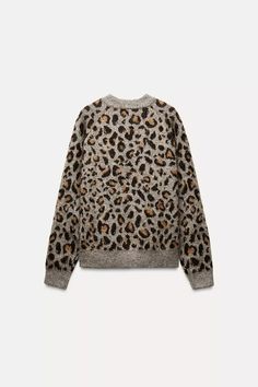 a sweater with leopard print on it