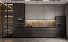 a modern kitchen with marble counter tops and dark cabinets, along with glass doors on the walls