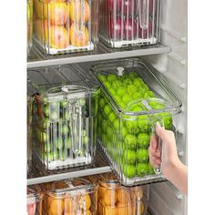 a refrigerator filled with lots of different types of fruits and veggies in containers