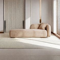 a living room filled with furniture next to tall wooden doors and windows covered in blinds