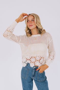 This top is designed for those who love to have fun and don't take themselves too seriously. The open knit crochet fabric gives it a unique and playful look, while the flower crochet pattern adds a touch of whimsy. Perfect for anyone who is happy to be here and wants to show it off! Details Open knit crochet Flower crochet pattern Long sleeves Sizing Approximate measurements: SIZE LENGTH BUST Small 23" 42" Medium 23" 44" Large 24" 48" Fabric has stretchModel is 5’10 wearing small Material 55% Co Spring Crew Neck Open Knit Crochet Top, Trendy Crochet Crew Neck Top With Open Knit, Trendy Crew Neck Crochet Top With Open Knit, Trendy Open Knit Crochet Crew Neck Top, Spring Vacation Crochet Lace Knit Top, Trendy Crochet Lace Tops For Spring, Open Knit Crochet Top With Crew Neck, Chic Lace Crochet Top With Pointelle Knit, Spring Cotton Knit Top With Crochet Lace