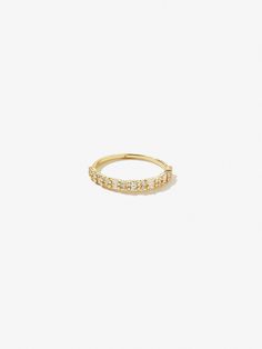 All great things come in dainty packages, especially when you take home this stackable ring. Our Darcy ring is dipped in 14K gold and features a mixture of baguette-cut and round-cut cubic zirconia gemstones. This stackable ring obviously loves company, so pair Darcy with bold rings, dainty rings, maybe some silver ringsthe choice is yours.  Dipped in 14K gold  Set with a variety of cubic zirconia gems  365-day warranty Everyday Gold Stackable Initial Ring, Gold Stackable Initial Ring For Everyday, Everyday Yellow Gold Diamond Ring With Si Clarity, Everyday Yellow Gold Diamond Ring Si Clarity, Everyday Stackable Open Diamond Ring, Classic Gold Stackable Crystal Ring, Gold Everyday Diamond Ring Tarnish Resistant, Everyday Yellow Gold Stackable Rings With Vs Clarity, Stackable Yellow Gold Crystal Ring For Everyday