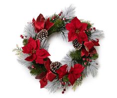 a christmas wreath with poinsettis and pine cones