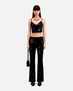 Black velvet cropped top with sequins | The Kooples - US Glamorous Cropped Sequin Crop Top, Evening Sequin Crop Top, Evening Sequined Crop Top, Sequin Spaghetti Strap Crop Top For Night Out, Evening Crop Top With Sequins And Spaghetti Straps, Glamorous Evening Crop Top With Contrast Sequin, Fitted Contrast Sequin Crop Top For Evening, Fitted Velvet Cropped Top, Fitted Velvet Crop Top