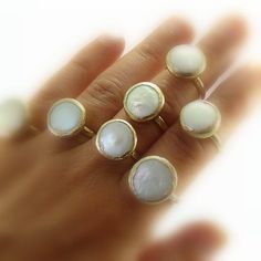 White Ethical Gemstone Rings For Gift, Pearl Stackable Round Rings For Anniversary, White Delicate Opal Ring For Gift, White Crystal Birthstone Ring For Gift, Delicate White Opal Ring As Gift, White Crystal Birthstone Ring As Gift, Stackable Round Pearl Ring, Delicate White Opal Round Ring, White Natural Stones Promise Ring