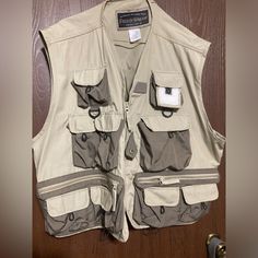 Field & Stream Unisex Khaki Multi-Zip-Pockets Fishing Jacket Vest Size Xxl Never Used. Great Condition Military Outerwear With Cargo Pockets For Adventure, Military Style Outerwear With Cargo Pockets For Adventure, Khaki Hiking Outerwear With Side Pockets, Khaki Outerwear With Multiple Pockets For Outdoor Activities, Adventure Utility Jacket With Pockets, Adventure Long Sleeve Utility Jacket With Pockets, Military Style Outerwear With Pockets For Outdoor, Winter Camping Outerwear With Pockets, Winter Outerwear With Pockets For Camping