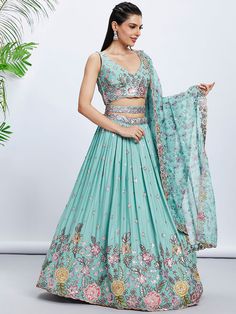 This Lehenga Choli is Ready to Wear Elevate your party wear game with our Turquoise Blue Multi Thread-Dull Golden Sequins Chiffon Embroidered Lehenga choli. This elegant piece boasts intricate embroidery and shimmering sequins in a stunning turquoise blue color. Perfect for any occasion, this lehenga choli is sure to turn heads and make you stand out in the crowd. Lehenga:-Made of premium quality Pure Chiffon fabric Full Flare Lehenga With Sequins work and Coding thread Embroidery work. Has a th