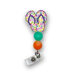 This Sea Shell Flip Flop Badge Reel is the perfect way to make a big splash at the office! Showing off your beach-loving personality with style, its beaded design and retractable, swiveling capabilities keep your ID or access badge just where you need it! Let your coworkers know you don't mess around when it comes to 'work-cessories'! Multicolor Retractable Badge Reel, Adjustable Multicolor Retractable Badge Reel, Adjustable Retractable Multicolor Badge Reel, Fun Multicolor Adjustable Badge Holders, Loving Personality, Big Splash, Trendy Accessories, Id Badge, Sea Shell