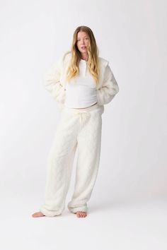 Lounge in style with our ivory cable-texture cozy pant. It features a rib tie-waistband, side welt pockets, and straight-leg styling for ultimate in cozy comfort. Cozy Fit Pants With Soft Texture, Cozy Pants With Soft Texture For Fall, Cozy Soft Texture Pants For Fall, Cozy White Pants For Winter, Cozy Cable Knit Bottoms For Loungewear, Cozy White Winter Pants, Cozy Cable Knit Loungewear Bottoms, Cozy Straight Sweatpants, Cream Pants For Winter Loungewear