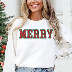 Merry Christmas Glitter Shirt Glitter Sweatshirt Merry Christmas Crewneck Glitter Holiday Sweater  HOW TO CHOOSE A SIZE To see our size chart, scroll through the photos. Our shirt measurements are listed in the photos section. Our shirts are Unisex so they will fit looser than a ladies fit tee. For an oversized look, most people will order a size larger. Please note that our size chart measurements are not circumference. HOW TO PLACE AN ORDER 1) Review all the information provided in the listing Winter Glitter Print Crew Neck Top, Winter Crew Neck Top With Glitter Print, T Shirt Press, Glitter Shirt, Christmas Glitter, Christmas Crewneck, Oversized Look, Holiday Sweater, Glitter Christmas